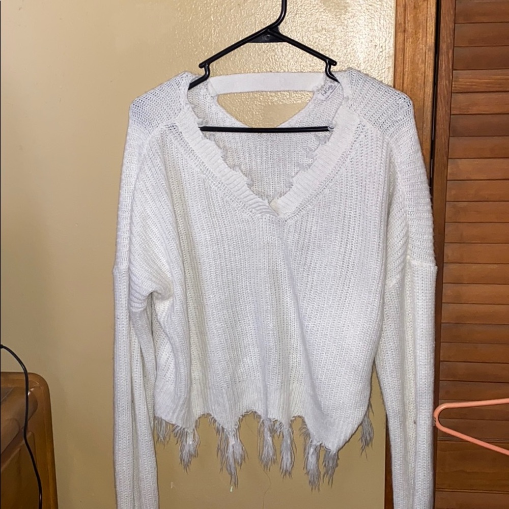 Distressed sweater